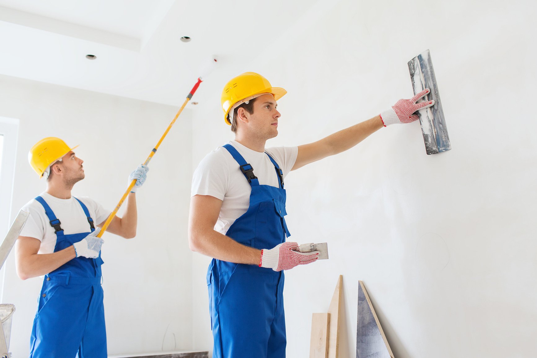 Group of Painters Painting the Wall